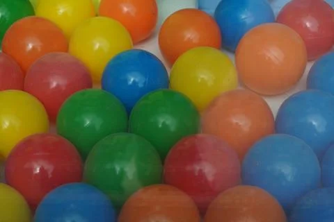 Multiple colored balls with a vitrine. Stock Photos