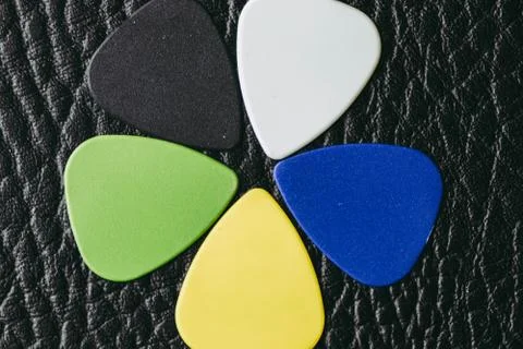 Multiple colored guitar picks Stock Photos