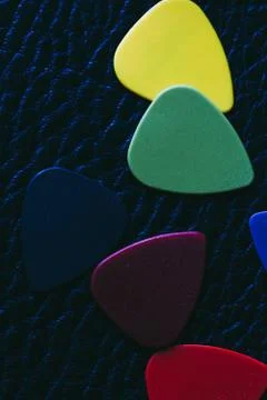 Multiple colored guitar picks Foto stock