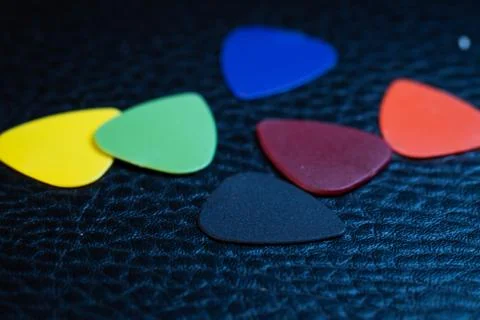 Multiple colored guitar picks Photos