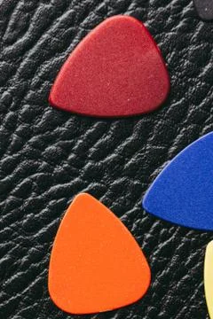 Multiple colored guitar picks Stock Photos
