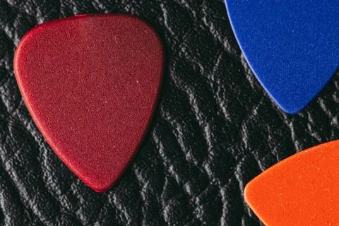 Multiple colored guitar picks Stock-Fotos
