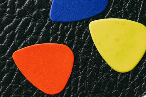 Multiple colored guitar picks Stock Photos