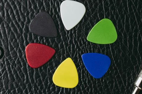 Multiple colored guitar picks Stock Photos