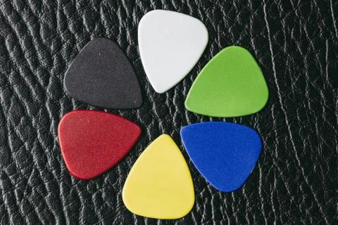 Multiple colored guitar picks Stock Photos