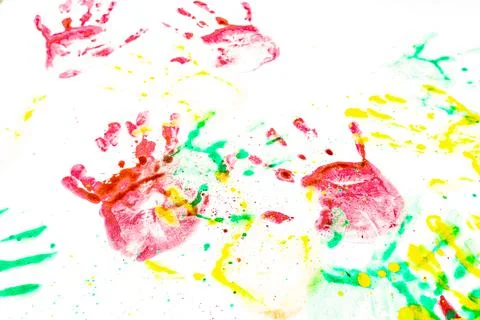 Multiple colored hand prints on a white background. Stock Photos