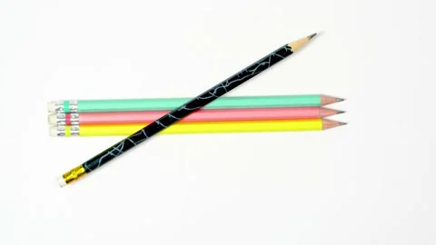Multiple coloured pencils as the camera pan to right Stock Footage 194985492
