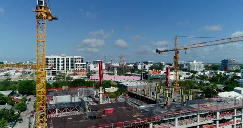Multiple cranes constructing a new building in Miami Stock Footage 197050415