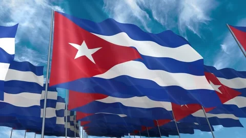 Multiple Cuba flags seamless looping waving on blue sky Stock Footage 343678895