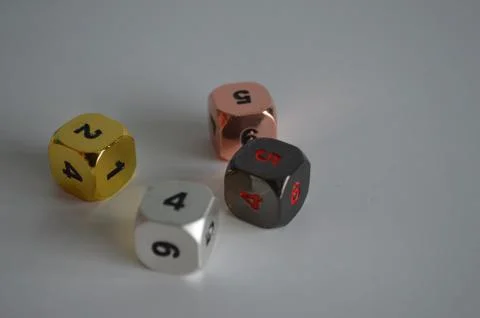 Multiple d6 six sided dice die copper silver gold black Foto stock
