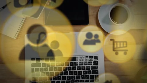 Multiple digital icons against coffee cup and electronic devices on wooden 스톡 동영상 139806834