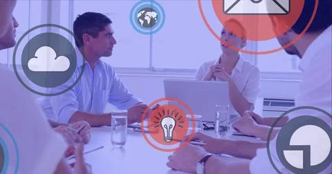 Multiple digital icons against group of office colleagues discussing in meeting Stock Illustration