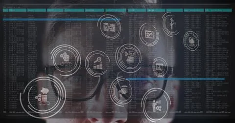 Multiple digital icons floating over male hacker against data processing on Stockfoto's