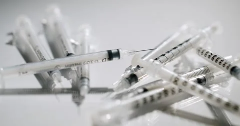 Multiple disposable insulin syringes with needles Stock Footage 343045646