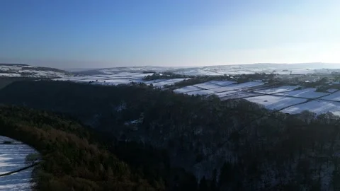 Multiple drone clips of snowy valley and forest. Stock Footage 231045654