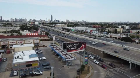 Multiple drone shots filmed over Houston highways and strip malls Stock Footage 289420475