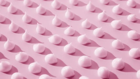 Multiple drops of pink cream on pale pin... | Stock Video | Pond5