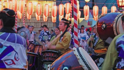 Multiple Drummers Surrounded by Close Seated Audience at Festival Stock Footage 345815929