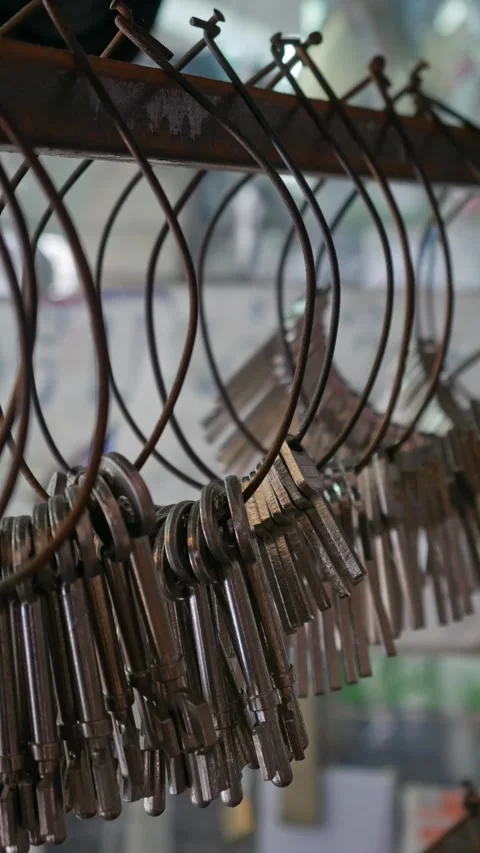 Multiple Duplicate Keys Hanging at Locksmith Shop Stock Footage 318213851