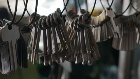 Multiple Duplicate Keys Hanging at Locksmith Shop Stock Footage 319522518