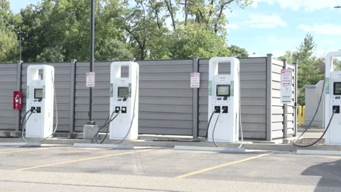 Multiple electric charging stations in parking lot 4k Stock-Footage 331665803