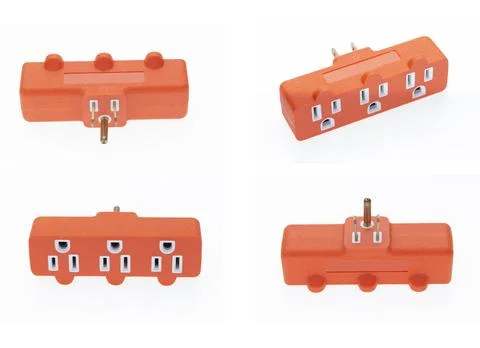 Multiple electrical socket, different angles, orange color isolated on whit.. Stock Photos