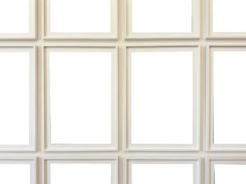 Multiple empty white picture frames arranged in a grid pattern on white Foto stock
