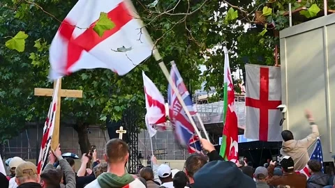 Multiple English Flags wuthin Central London, United Kingdom 스톡 동영상 317299372