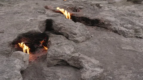 Multiple Eternal Flames Burning from Cracks in the Rocky Terrain at the Chimaera Stock Footage 304193566