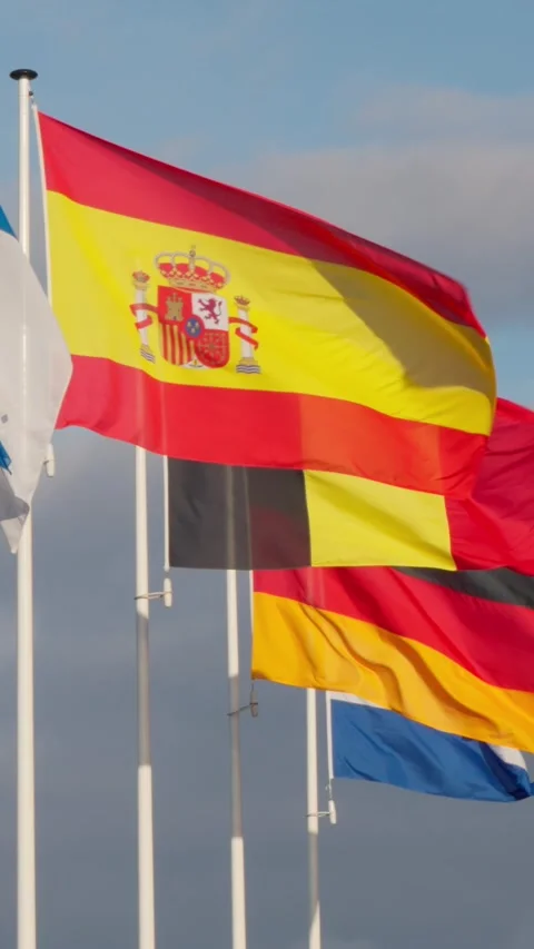 Multiple European national flags, including Spain, Belgium, and Germany, waving Stockbeeldmateriaal 333034284