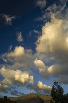 Multiple exposure composite of a group of soft clouds floating over the Iguaq Foto stock