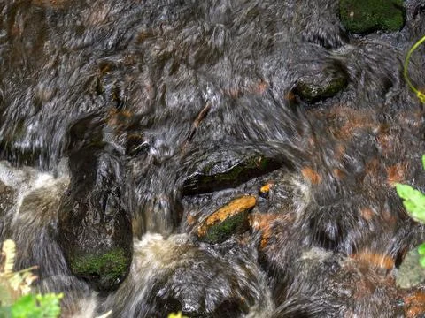Multiple exposure composite from the top of the stream and rocks of a river i Foto stock