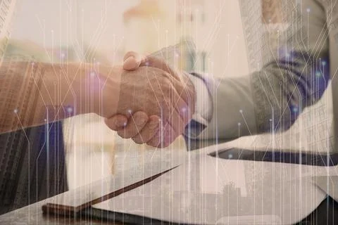 Multiple exposure of partners shaking hands, circuit board pattern and buildi Stock Photos