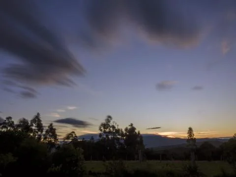 Multiple exposure of some clouds at sunset over the central mountains of Colo Stock Photos