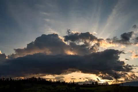 Multiple exposure of a wonderful cloudy sunset in the Andean mountains of cen Stock-Fotos