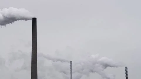 Multiple Factory chimney smoke on a gray day. Monochromatic. Stock Footage 170503805