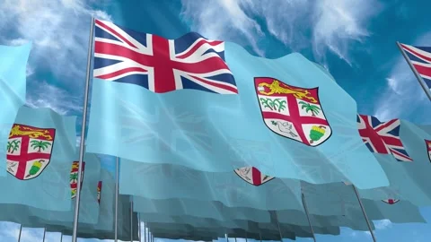 Multiple Fiji flags seamless looping waving on blue sky Stock Footage 343680364