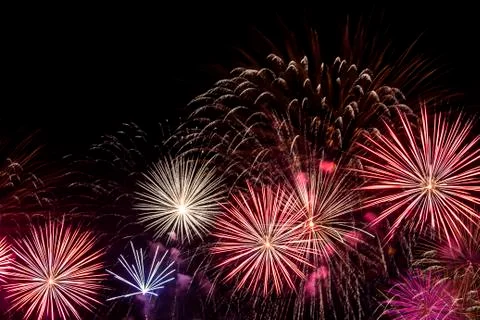 Multiple fireworks on black sky Stock Photos