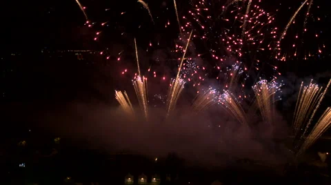 Multiple fireworks blast and explosions during on Christmas or new years eve Stock Footage 55709466