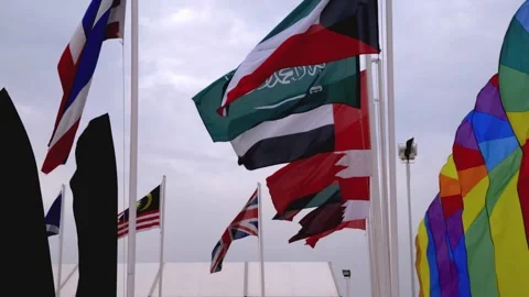 Multiple flags in the wind Video stock 174955838