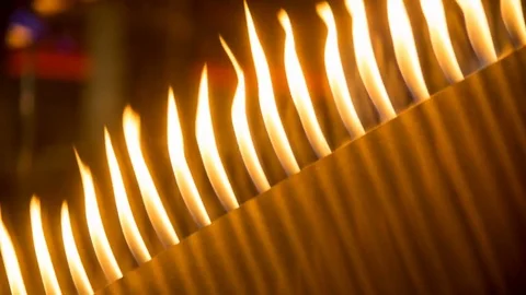Multiple Flames in a Row Installation Stock Footage 79537526