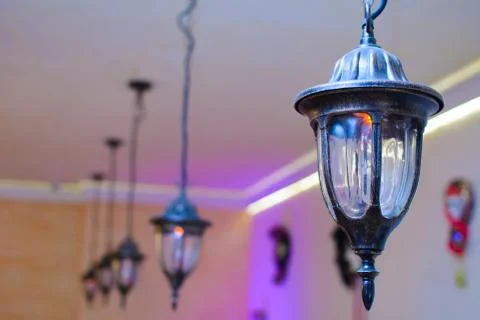 Multiple forged lamp from the ceiling Stock Photos