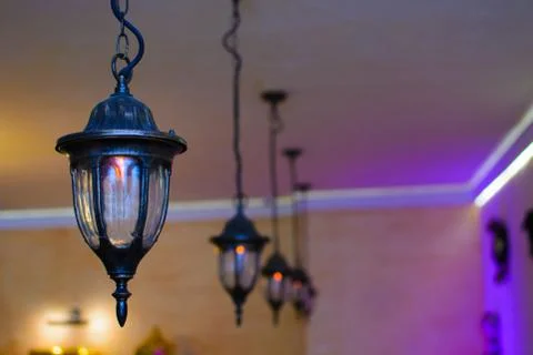 Multiple forged lamp from the ceiling Stock Photos