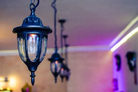 Multiple forged lamp from the ceiling Stock Photos