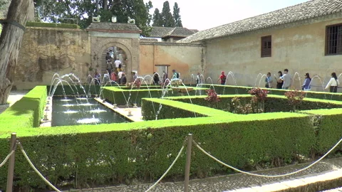 Multiple Fountains Surrounded by Hedges at Generalife Gardens in Alhambra Stock Footage 237823408