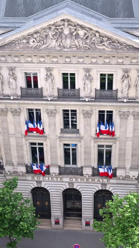 Multiple French flags hanging on a building in Paris, France Stock Footage 278797982