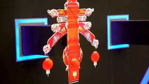 Multiple futuristic digital interfaces being presented on a small holographic Stock Footage 96225873