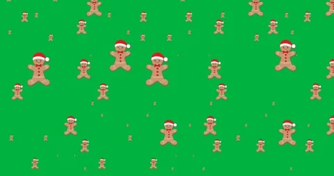 Multiple gingerbread wearing a santa hat icons in seamless pattern against black Stock Footage 318815671
