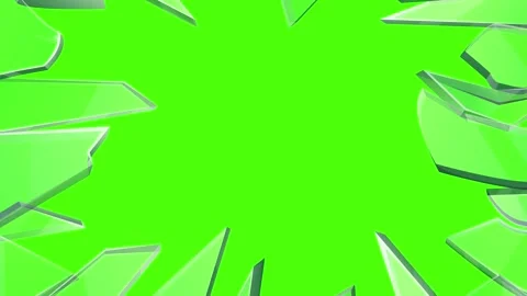 Multiple glass shards falling into a green Video stock 341745321