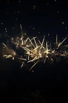 Multiple golden fireworks Stock Photos